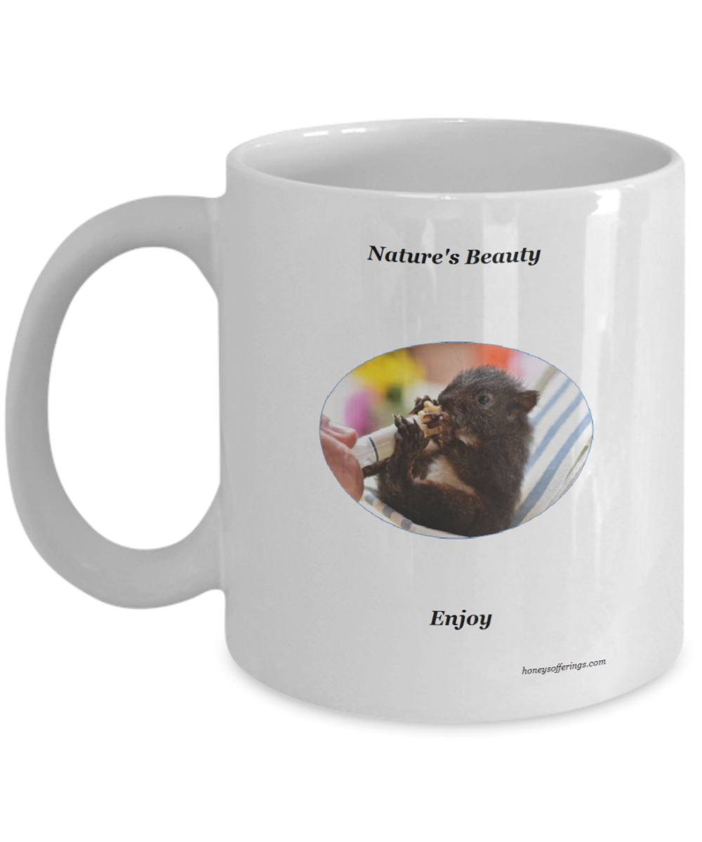 Coffee Mug with Tiny Baby Squirrel Natures Beauty Coffee Mug with Baby Squirrel being hand fed by loving human.