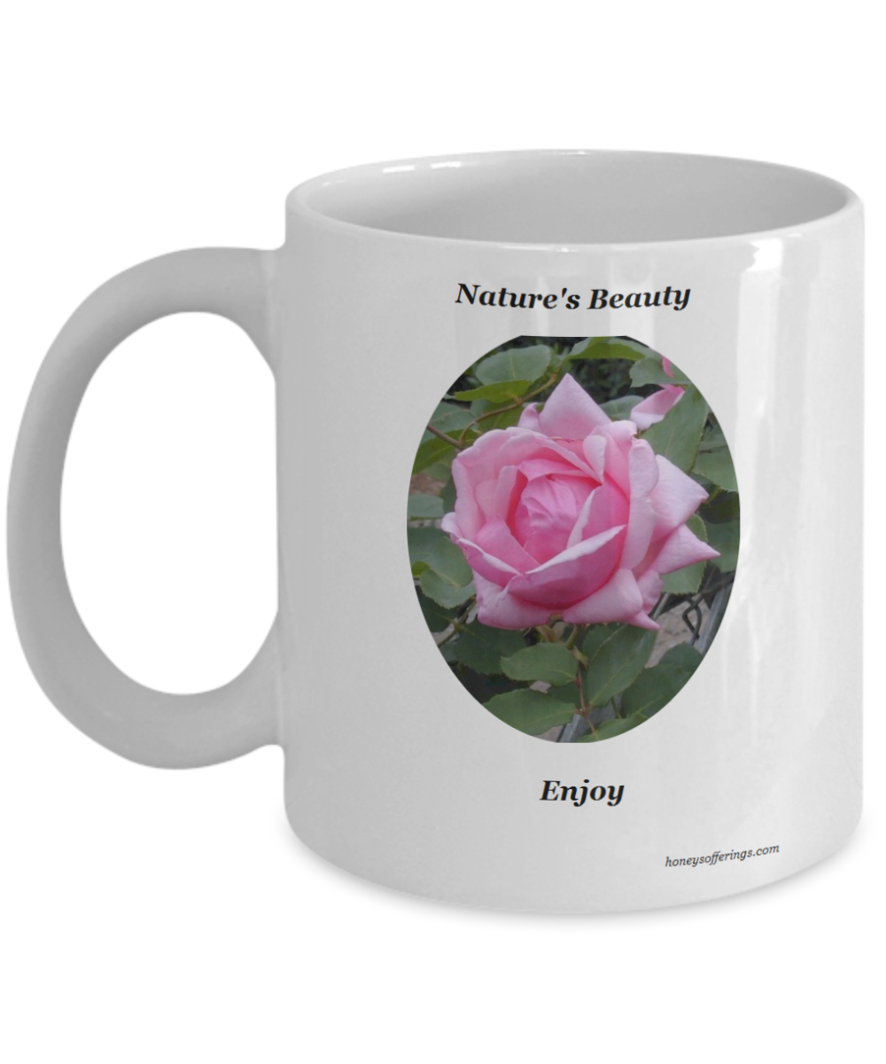 Coffee Mug with Single Pink Rose Single Pink Rose Mug for yourself or as a gift. Enjoy the beauty of this single pink rose on the sides of this coffee mug. The pink rose carries a meaning of joy, gentleness, appreciation and sweetness making it a special gift for so many people.