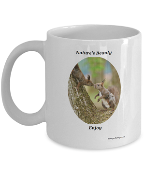 Squirrel Mug with Mom and Baby Squirrel in a tree. Coffee Mug with Mom and Baby Squirrel.  Enjoy your morning coffee while viewing this precious nature scene of a squirrel family in a tree. Squirrel Mug Gift for the Nature Lover.